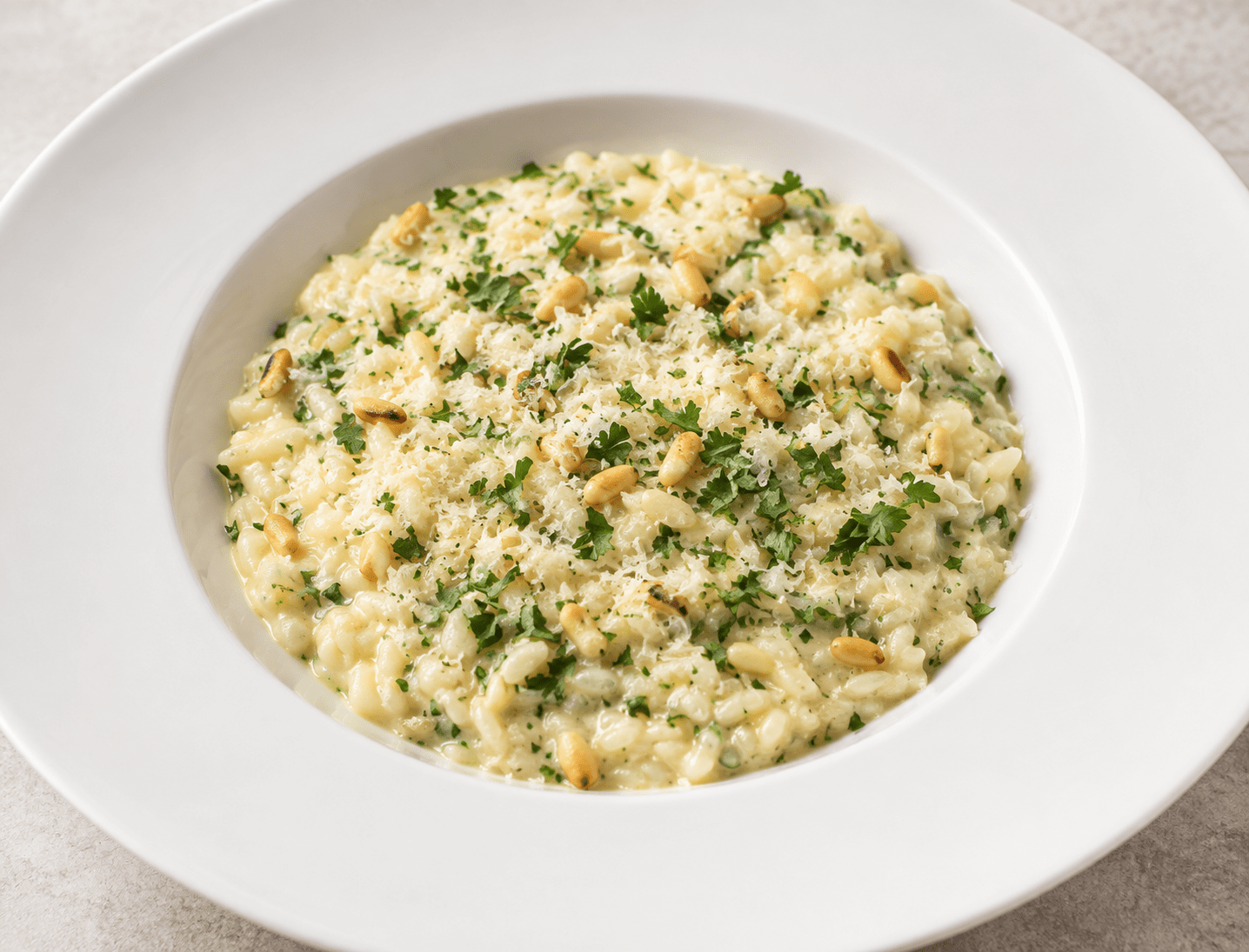 Parmezaanrisotto met pijnboompitten - Food to Enjoy